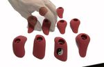 Red pinch climbing holds,
