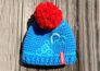 Super schöne, Hand gemachte Pompom Mütze in der Farbe blau mit rotem Bommel. Mit Innenfleece. Größe: ca. 50 cm - ca. 1-4 Jahre
