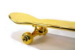 solid-gold-skateboard-680x453